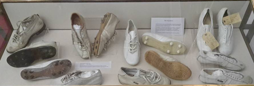 Collection of white cricket boots and shoes